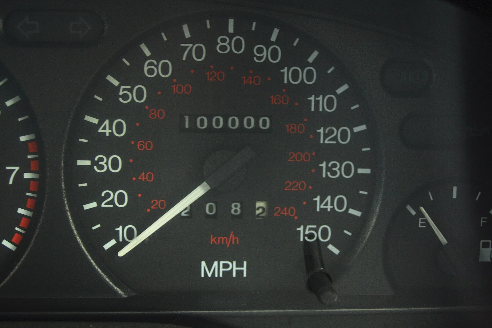 An odometer displaying a total of 100,000 miles.
